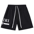 AMIRI Letter Logo Swim Board Shorts